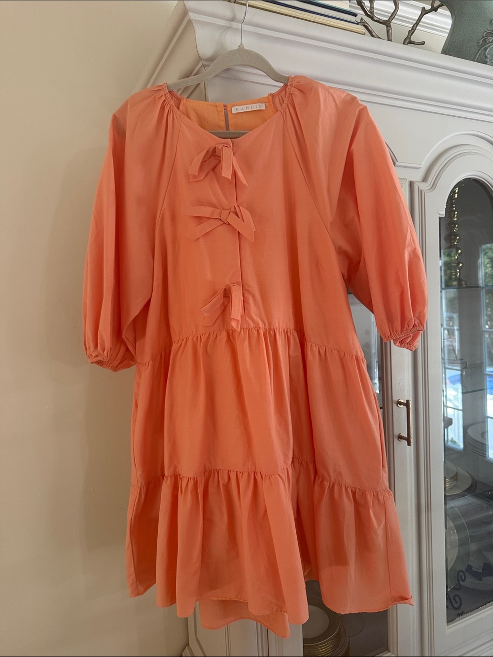 Karlie Coral Tiered Bow-Front Casual Dress
